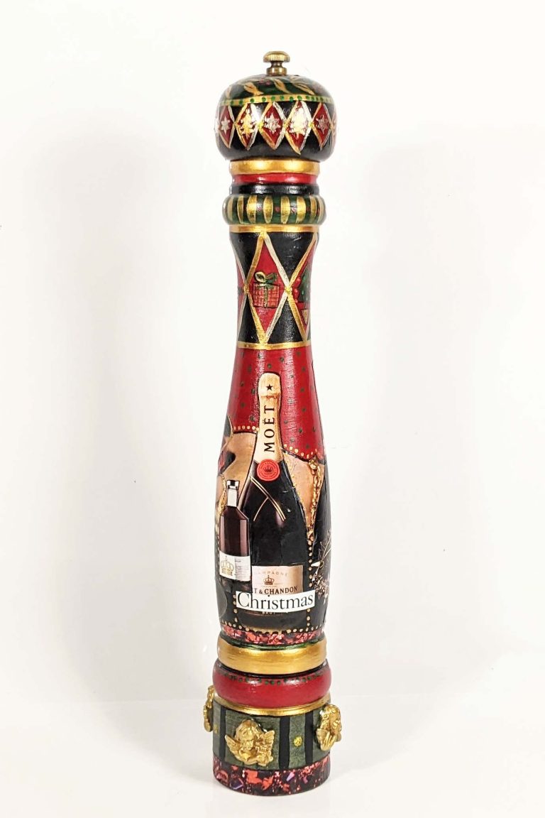 Image of a hand-painted pepper mill with a Christmas theme.